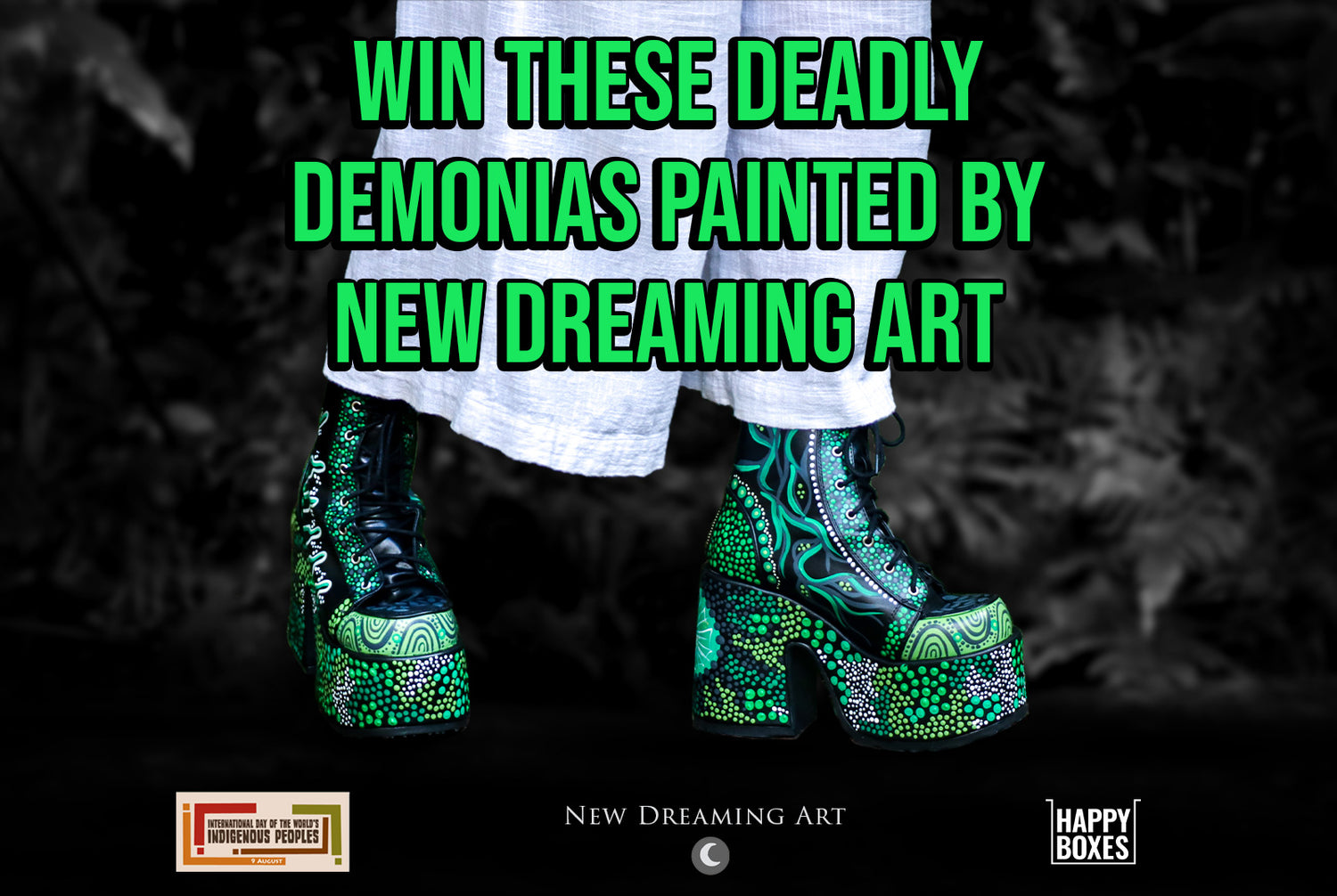 Win a pair of Demonias painted by New Dreaming Art | Image depicts a photograph of artist Nikita Fitzpatrick wearing the hand-painted Demonia Camel-203s in front of a blurred black and white forest background. Logos for IDOWIP and Happy Boxes are shown.
